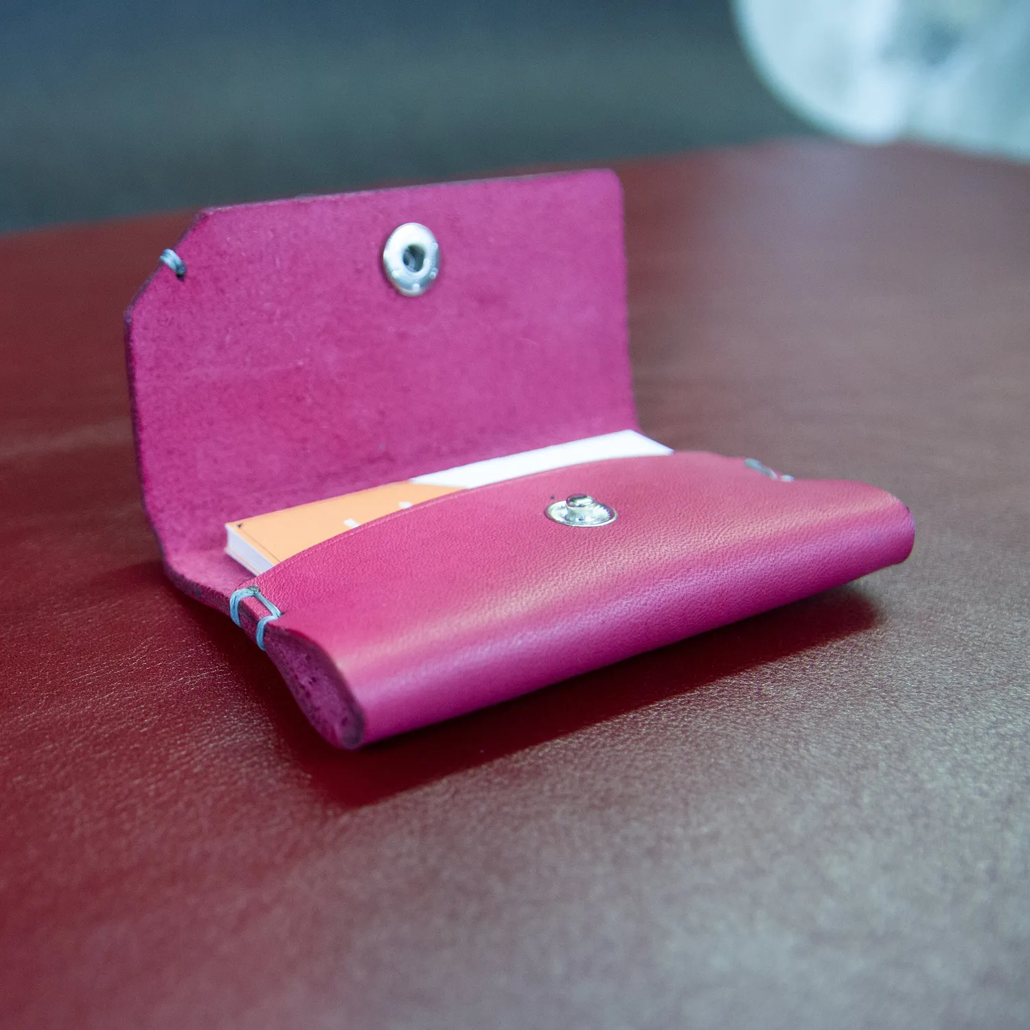CagnaCuir Atelier Le Discret porte-cartes cuir fuschia 12 cartes